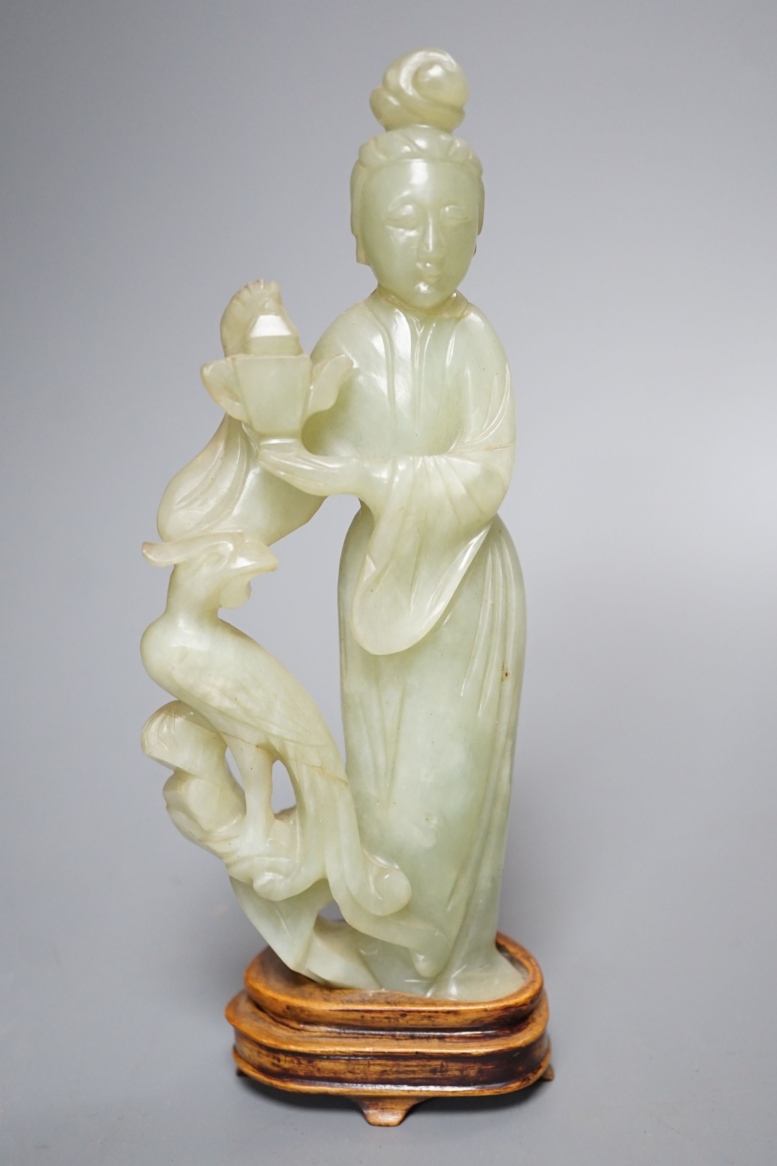 A small enamelled cloisonné vase, 10cm, together with a carved bowenite jade figure, on wood plinth and glazed ceramic brush pot